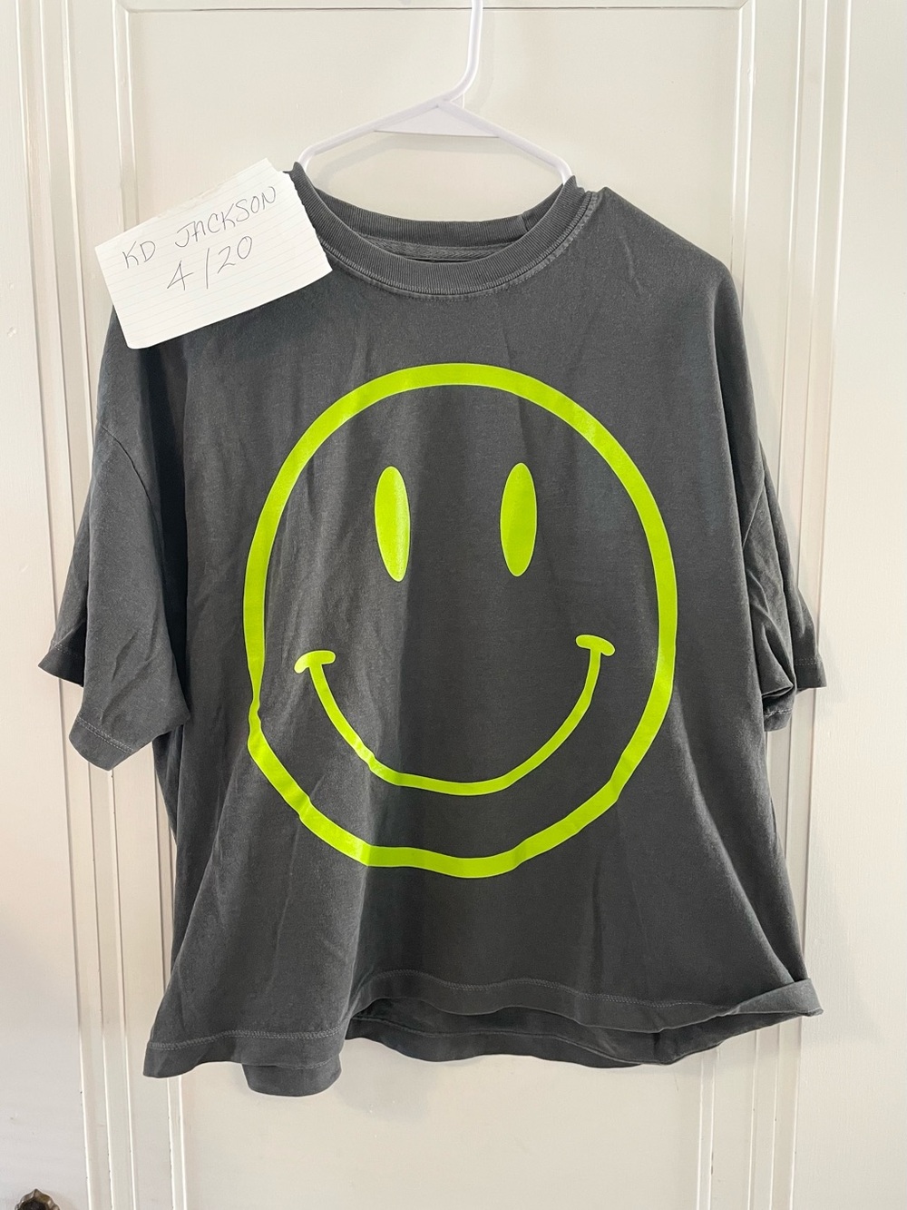 Dressed In Lala cropped Tee with Neon Green Smiley Graphic